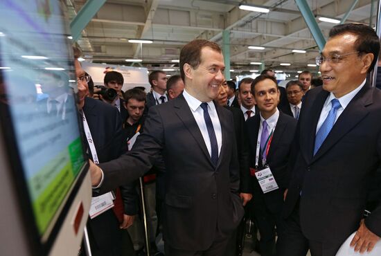 Dmitry Medvedev and Li Keqiang attend Open Innovations Forum