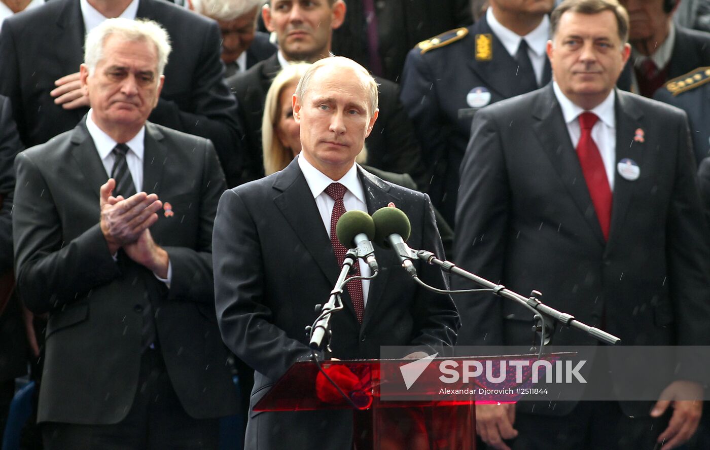 16 October 2014. Russian President Vladimir Putin makes a speech at the 'Victor's March" military parade marking the 70th anniversary of the liberation of Belgrade from German fascist invaders. Location: Serbia, Belgrade. Author: Alexandar Djorovich/Sputnik. Vladimri Putin visits Serbia