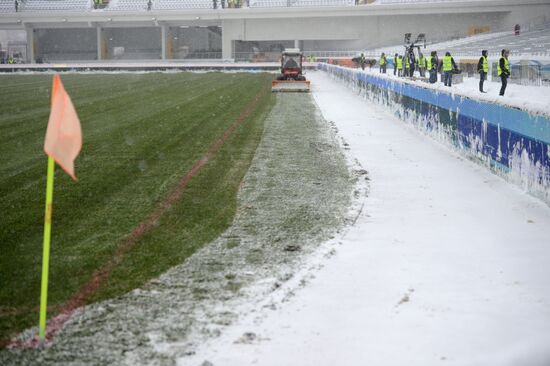 Snow removed from football pitch prior to Ural vs. Spartak match