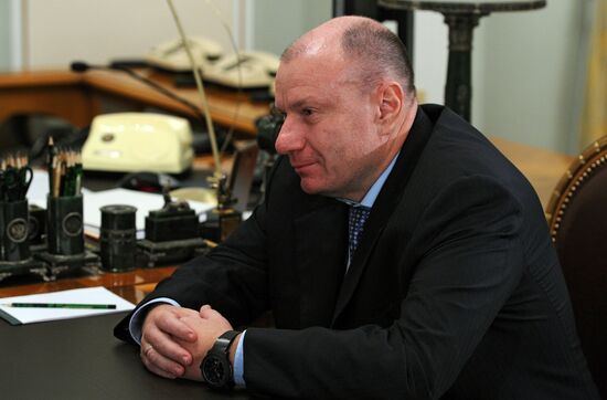 Vladimir Putin meets with Vladimir Potanin