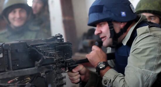 Actor Mikhail Porechenkov visits rebel positions at Donetsk airport