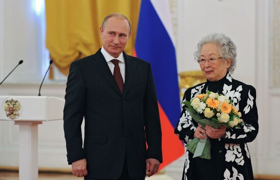 Vladimir Putin presents state awards to foreign citizens