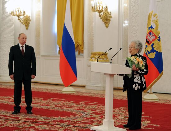 Vladimir Putin presents state awards to foreign citizens