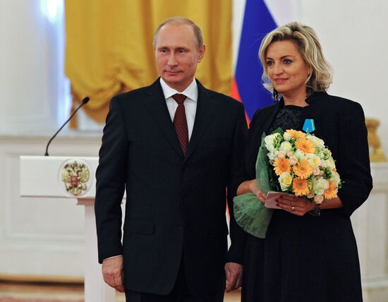 Vladimir Putin presents state awards to foreign citizens