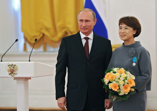 Vladimir Putin presents state awards to foreign citizens