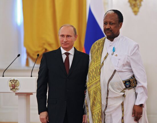 Vladimir Putin presents state awards to foreign citizens