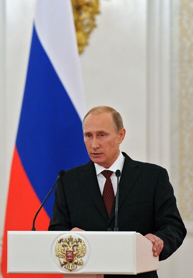 Vladimir Putin presents state awards to foreign citizens