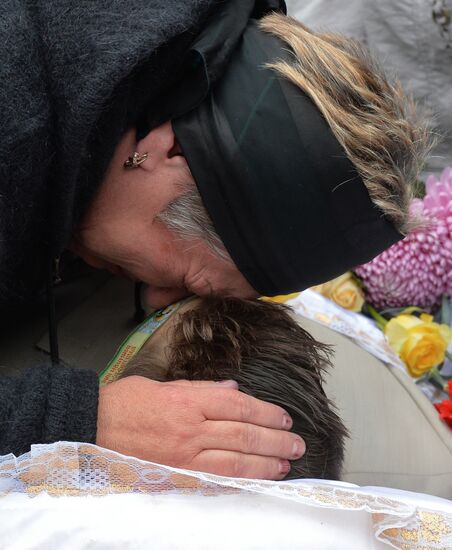Mourning ceremony for chidren killed in Donetsk