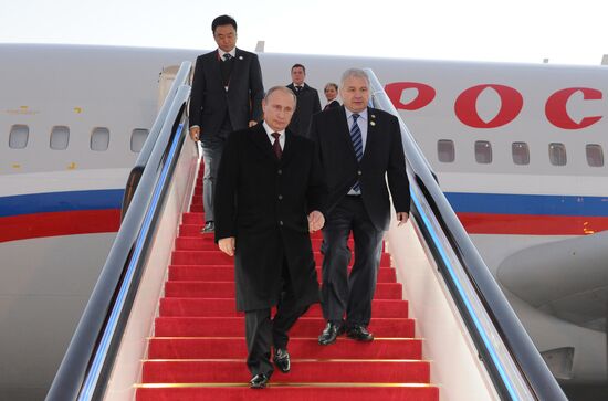 Vladimir Putin visits China