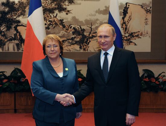 Vladimir Putin visits China