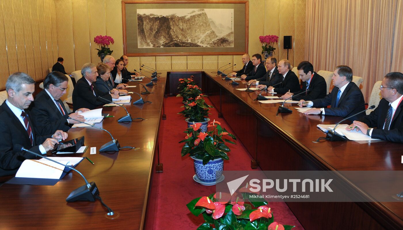 Vladimir Putin visits China