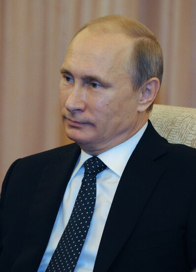 Vladimir Putin visits China