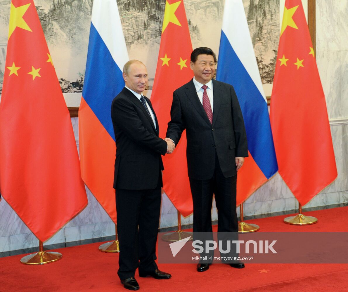 Vladimir Putin visits China