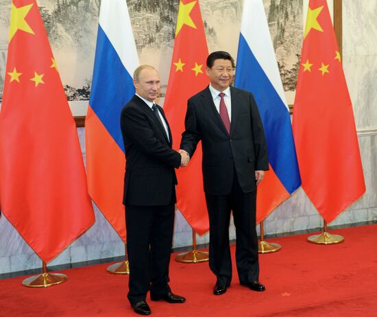 Vladimir Putin visits China