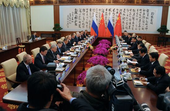 Vladimir Putin visits China