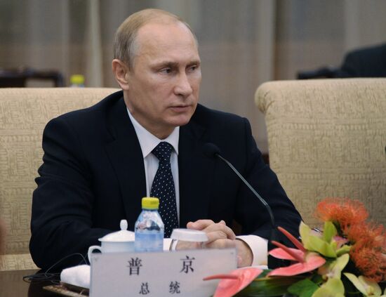 Vladimir Putin visits China