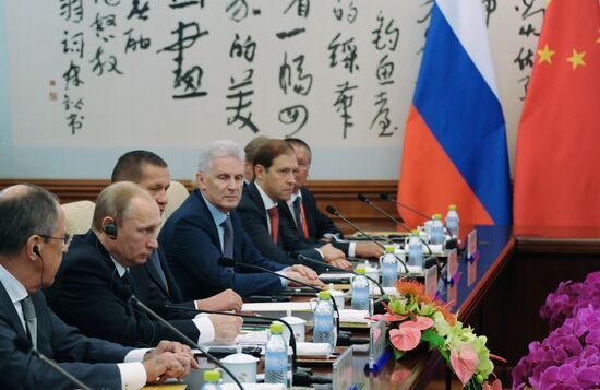 Vladimir Putin visits China