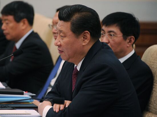 Vladimir Putin visits China