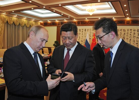 Vladimir Putin visits China