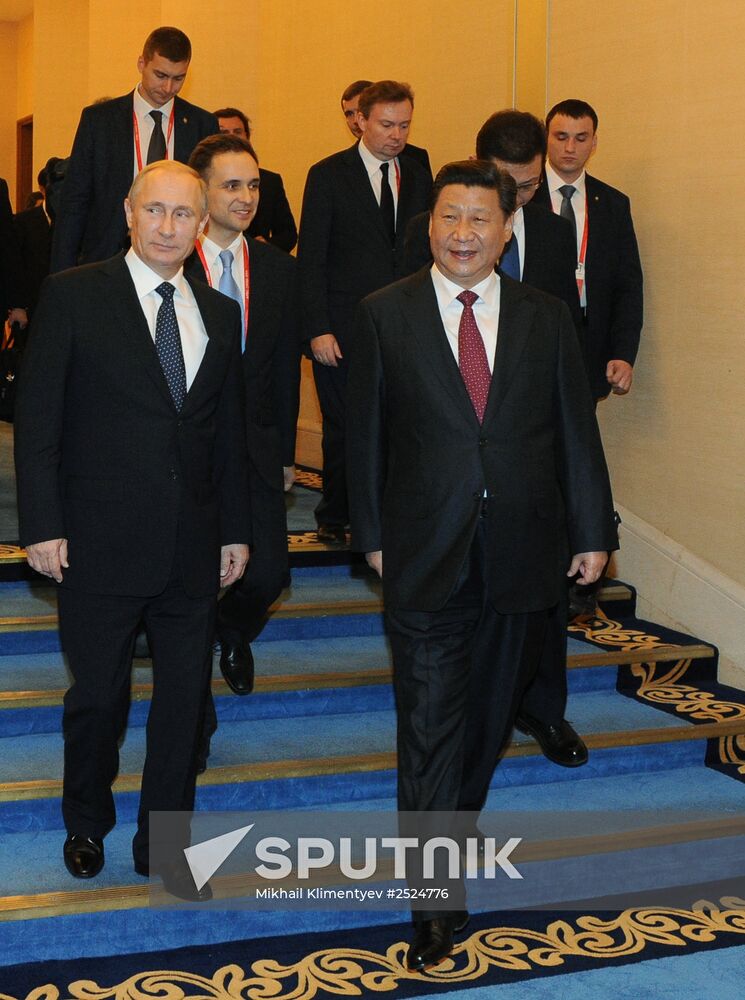 Vladimir Putin visits China