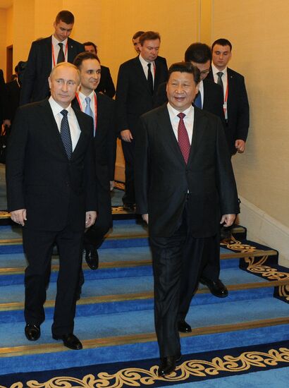 Vladimir Putin visits China