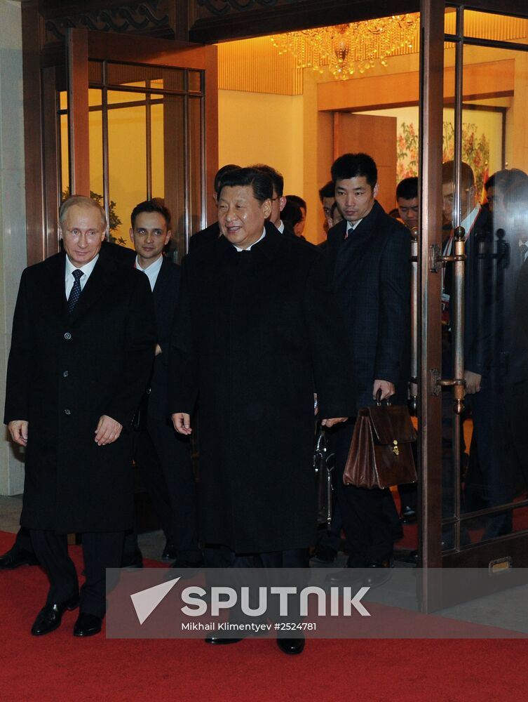 Vladimir Putin visits China