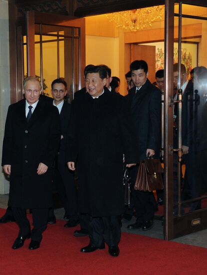 Vladimir Putin visits China