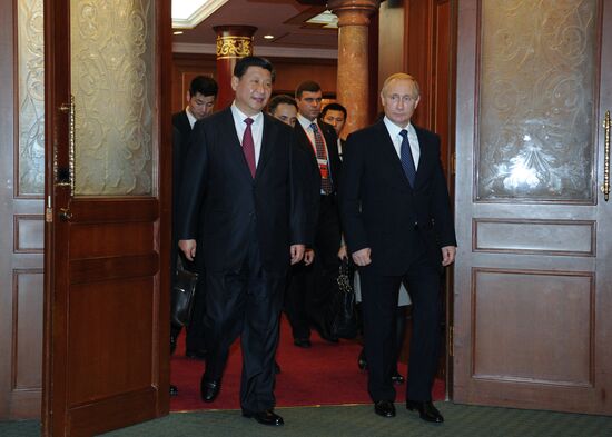 Vladimir Putin visits China