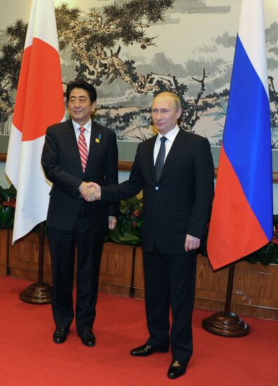 Vladimir Putin visits China