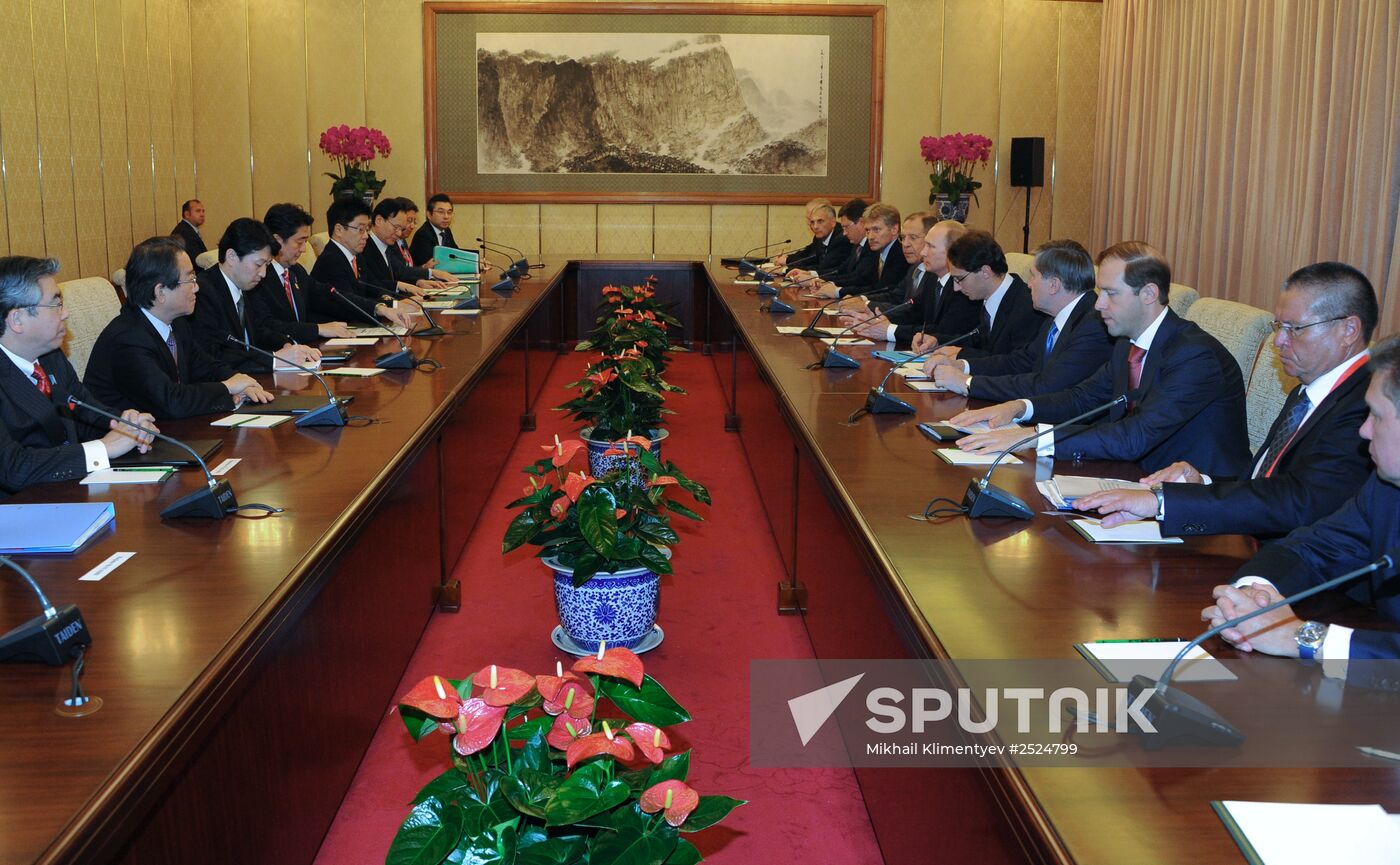 Vladimir Putin visits China