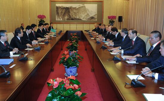 Vladimir Putin visits China