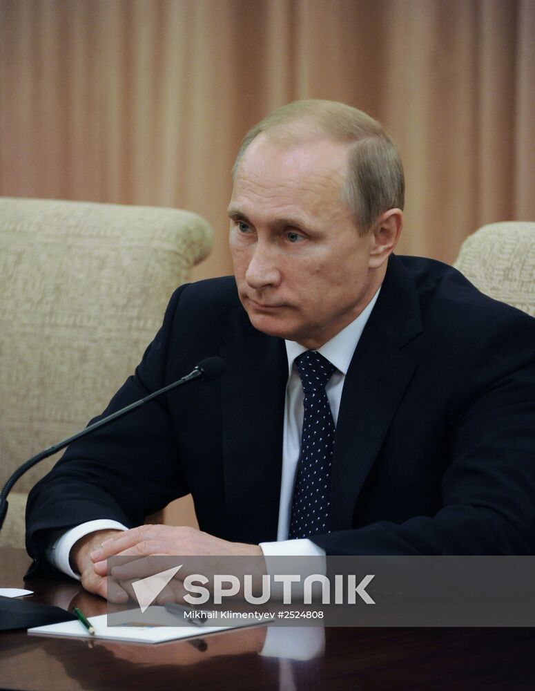 Vladimir Putin visits China