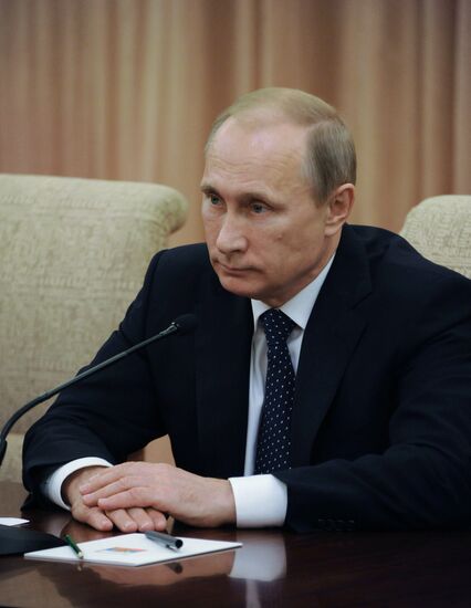 Vladimir Putin visits China