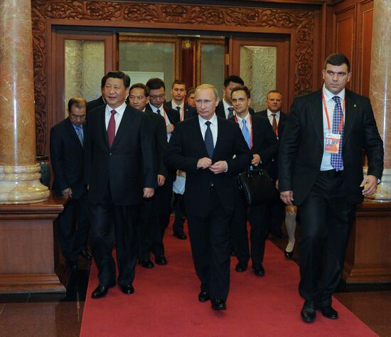 Vladimir Putin visits China