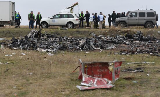 Dutch experts work at Malaysia Airlines Flight MH17 crash site