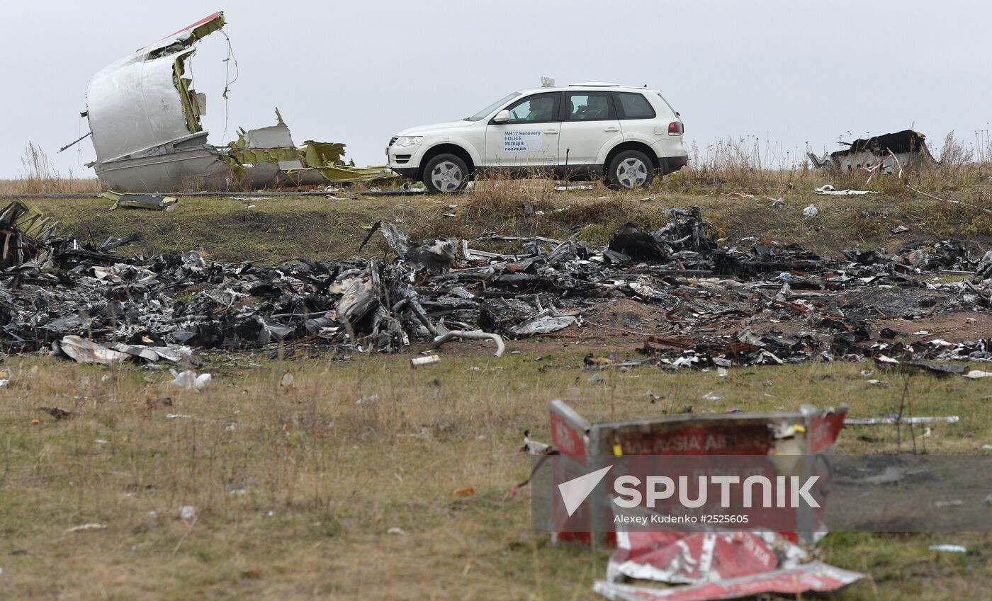 Dutch experts work at Malaysia Airlines Flight MH17 crash site