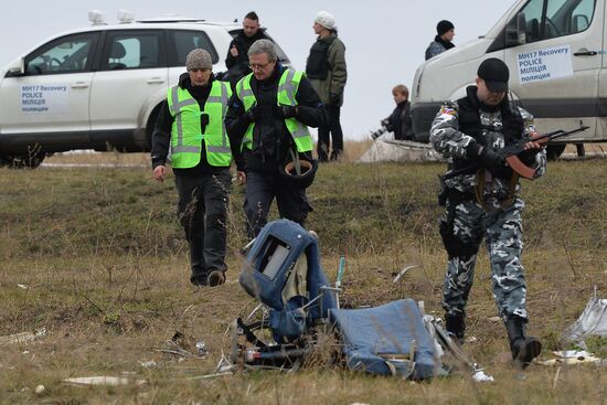 Dutch experts work at Malaysia Airlines Flight MH17 crash site