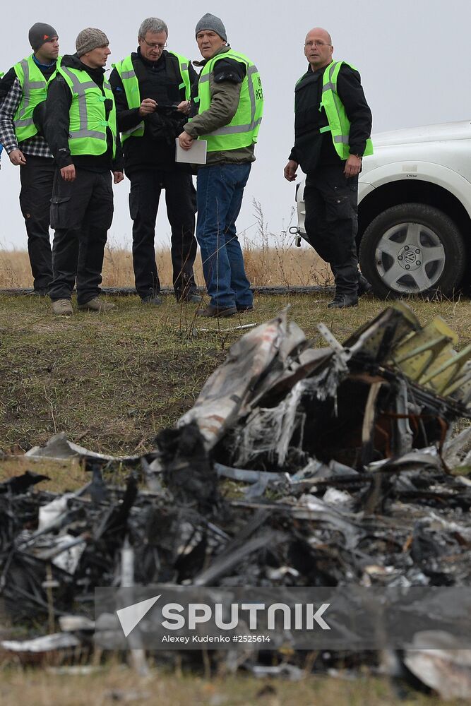 Dutch experts work at Malaysia Airlines Flight MH17 crash site