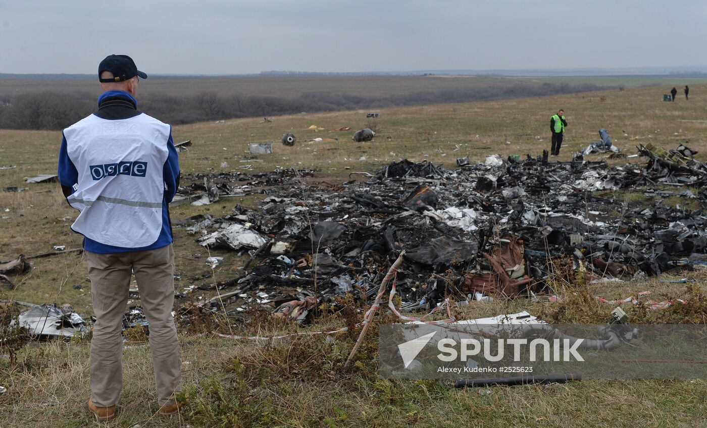 Dutch experts work at Malaysia Airlines Flight MH17 crash site
