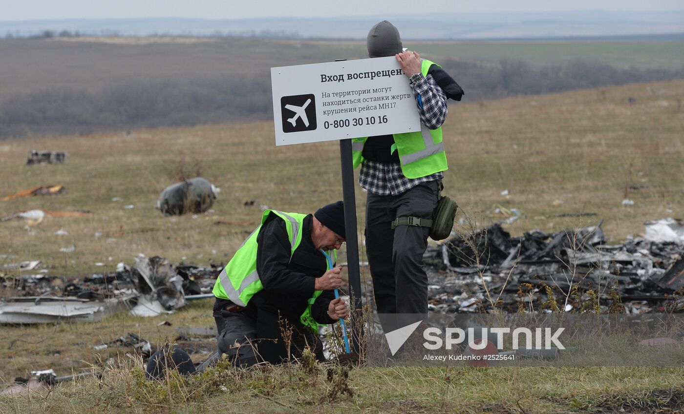 Dutch experts work at Malaysia Airlines Flight MH17 crash site