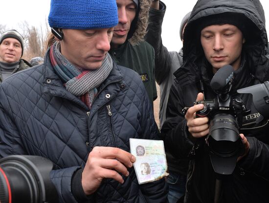 Dutch experts work at Malaysia Airlines Flight MH17 crash site