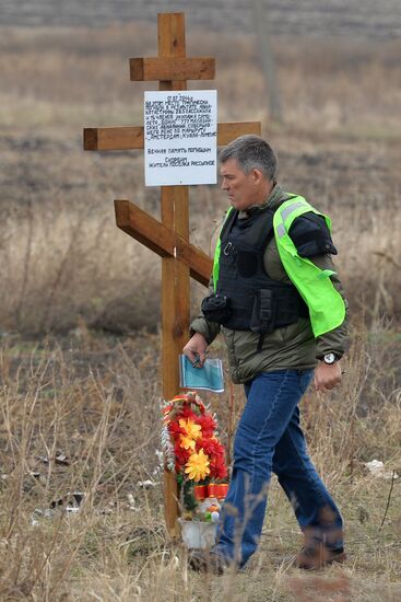 Dutch experts work at Malaysia Airlines Flight MH17 crash site