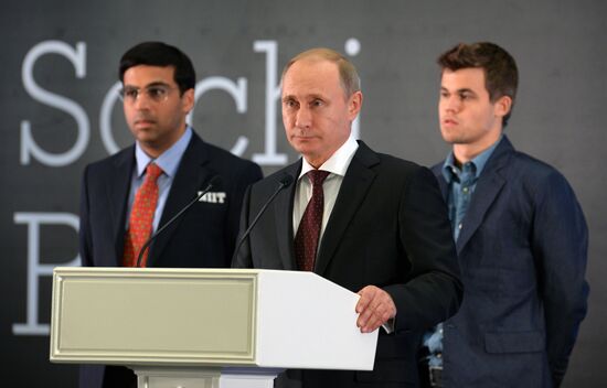 Vladimir Putin attends award ceremony for world chess champion