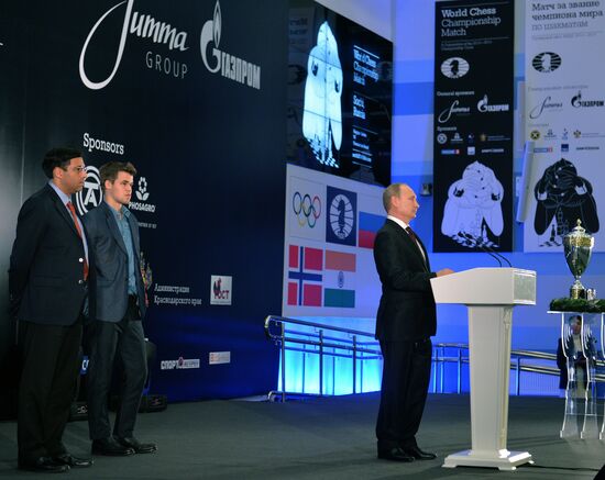 Vladimir Putin attends award ceremony for world chess champion