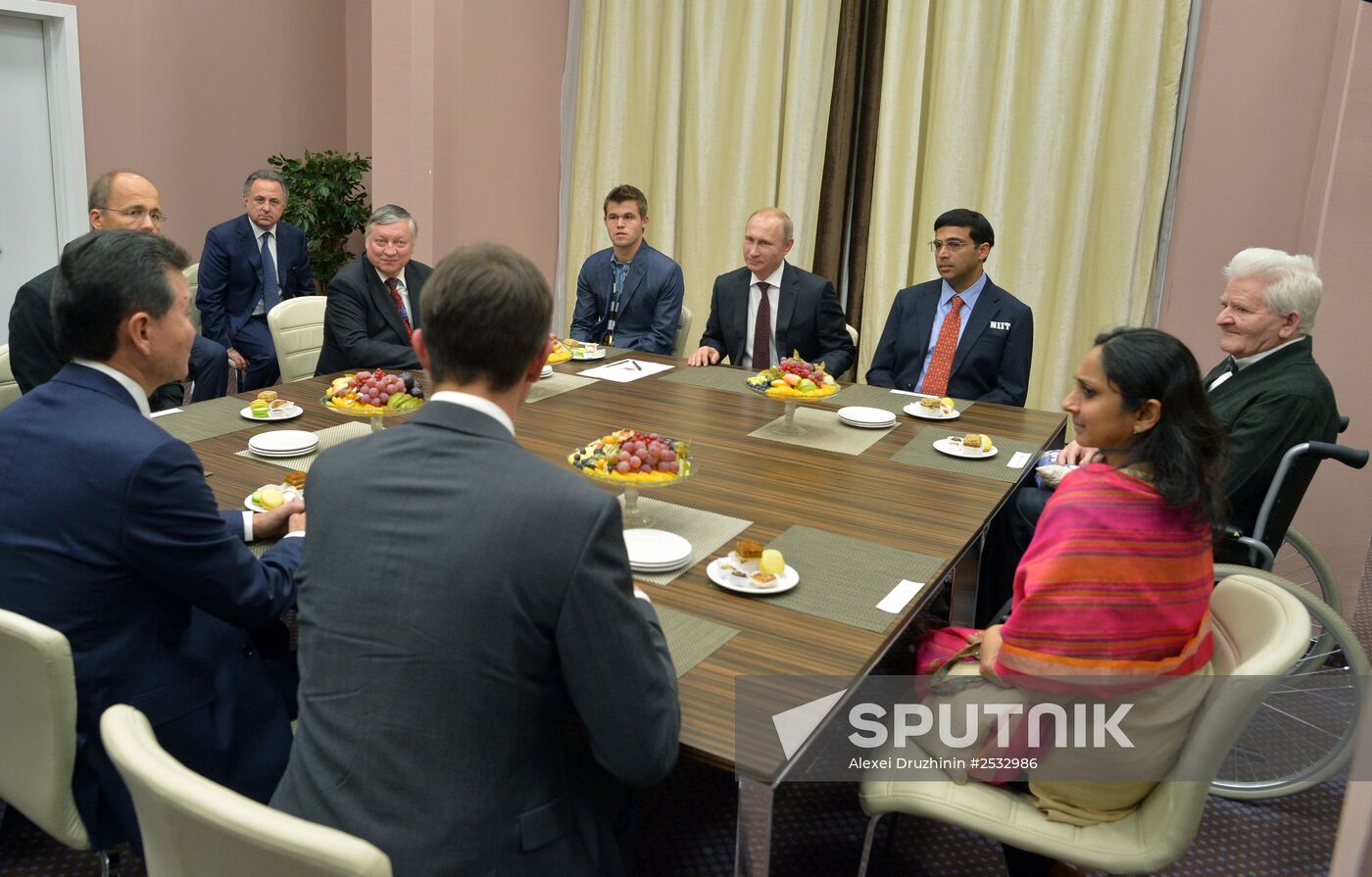 Vladimir Putin attends award ceremony for world chess champion