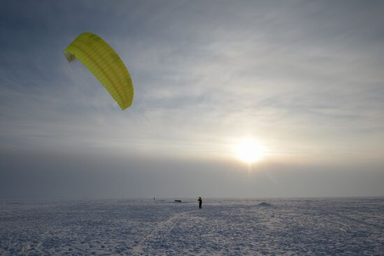Siberian Winter Snow-Kiting Cup on the ice-covered reservoir of the Novosibirsk hydropower station