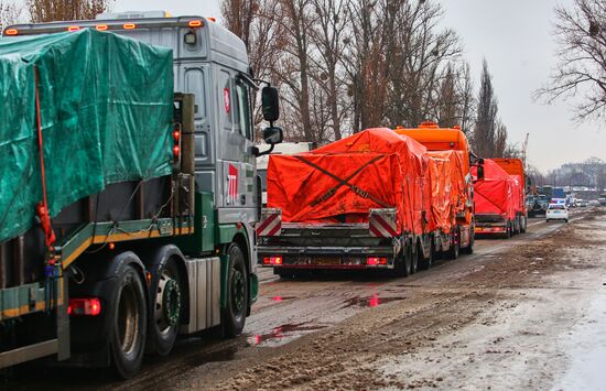 Four trucks carrying pieces of Boeing 777 wreckage sent from Kharkiv to Netherlands