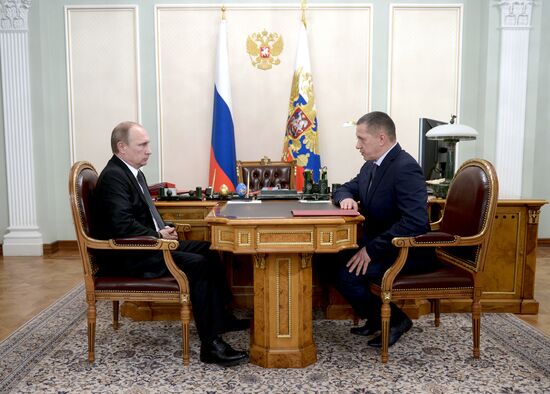 Russian President Vladimir Putin meets with Russian Deputy Prime Minister Yury Trutnev