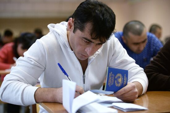 Taking exams at migrant testing center