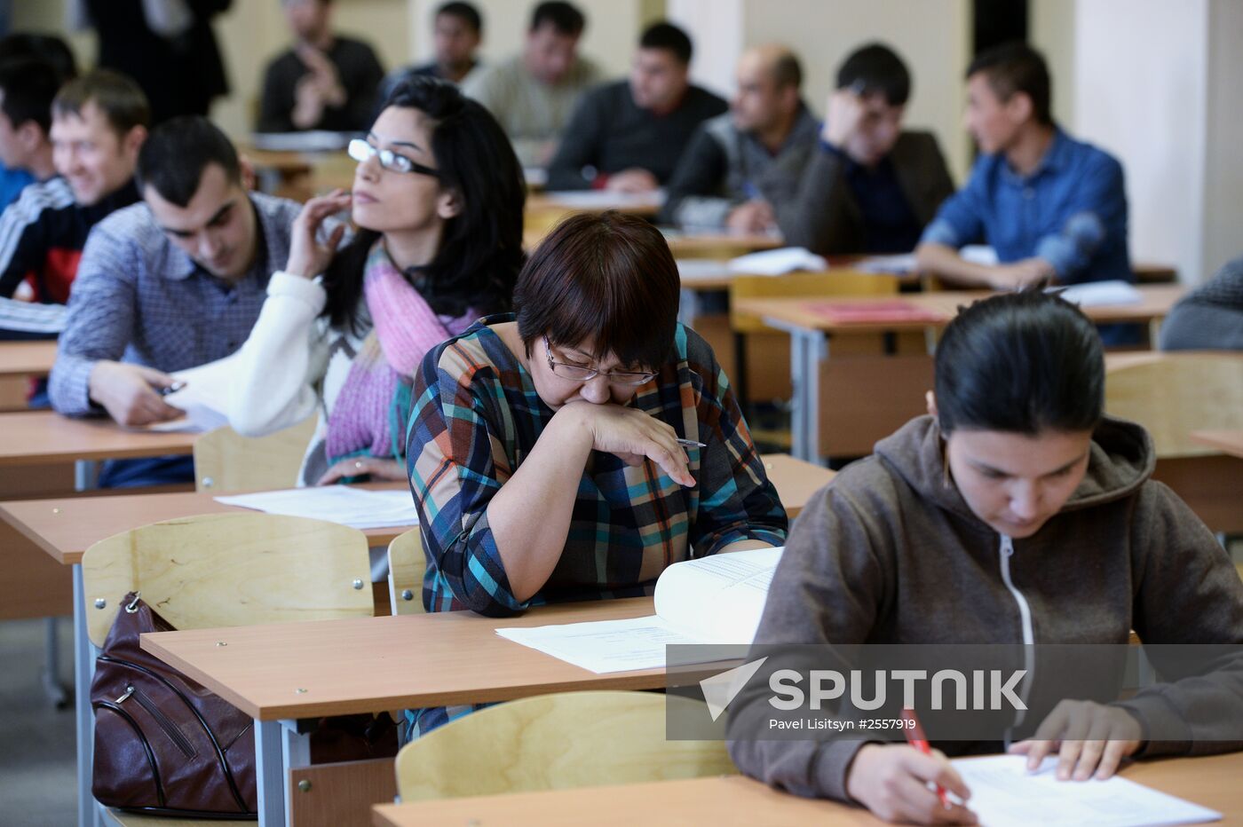 Taking exams at migrant testing center